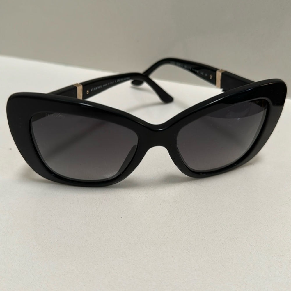 Versace glasses gently used